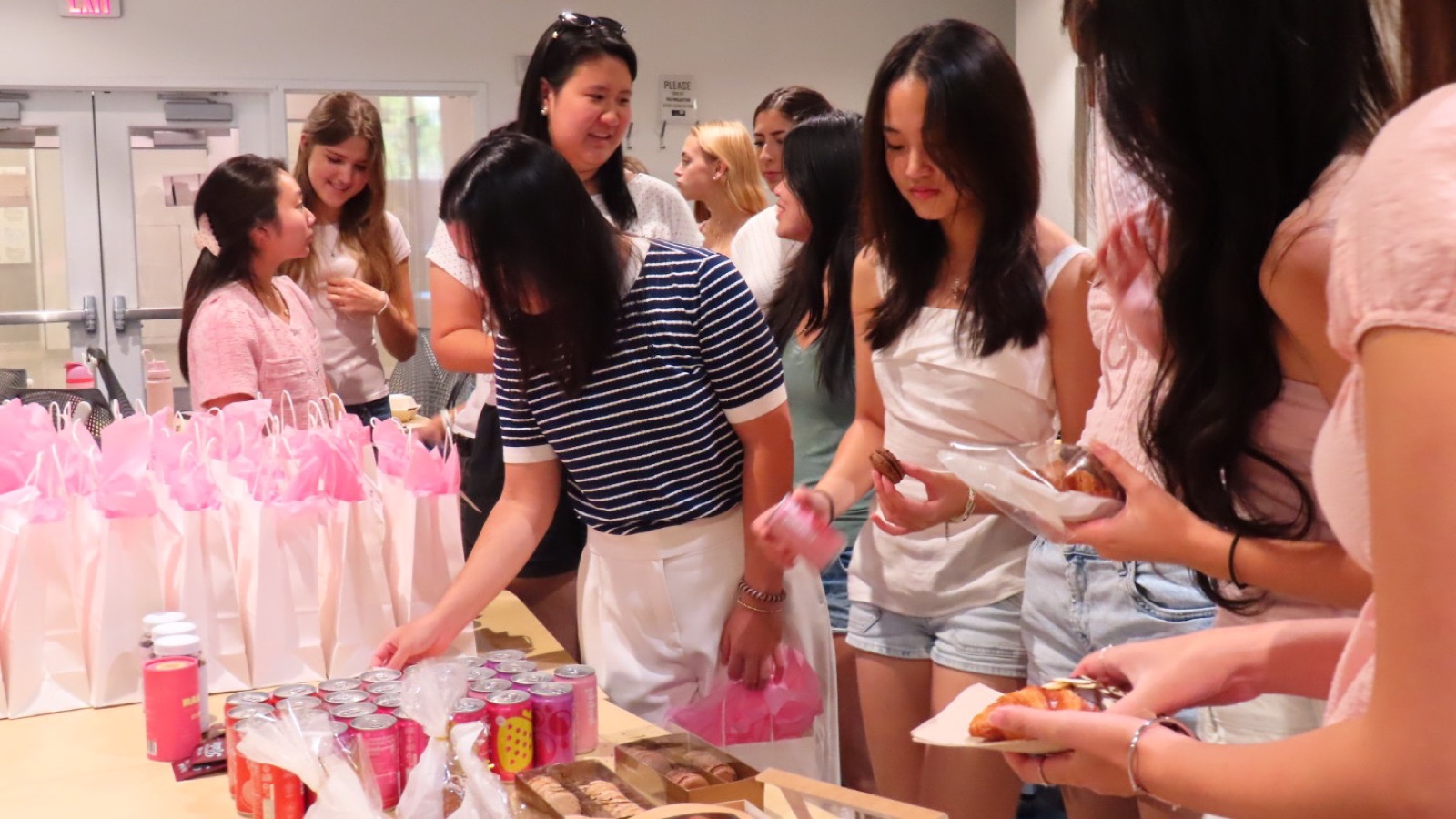 Fellows picking up snacks and welcome bags at a Girls Into VC kickoff